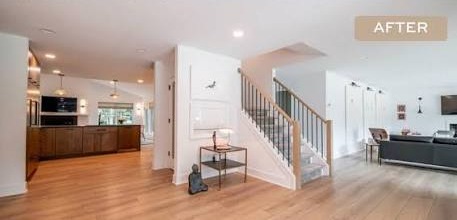 Open living & staircase, after renovation — supplied reference
